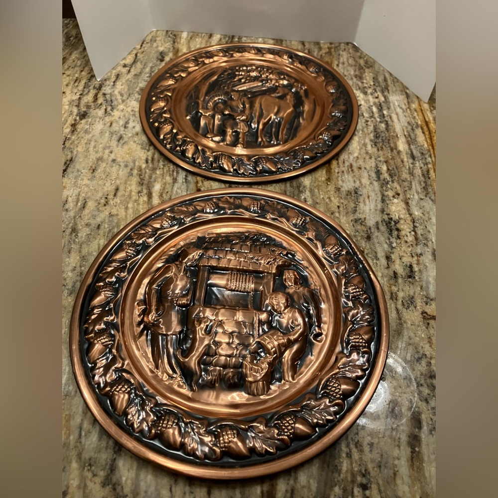 Set up two Copper Craft Guild Copper Wall Accent Plates
12 inch
